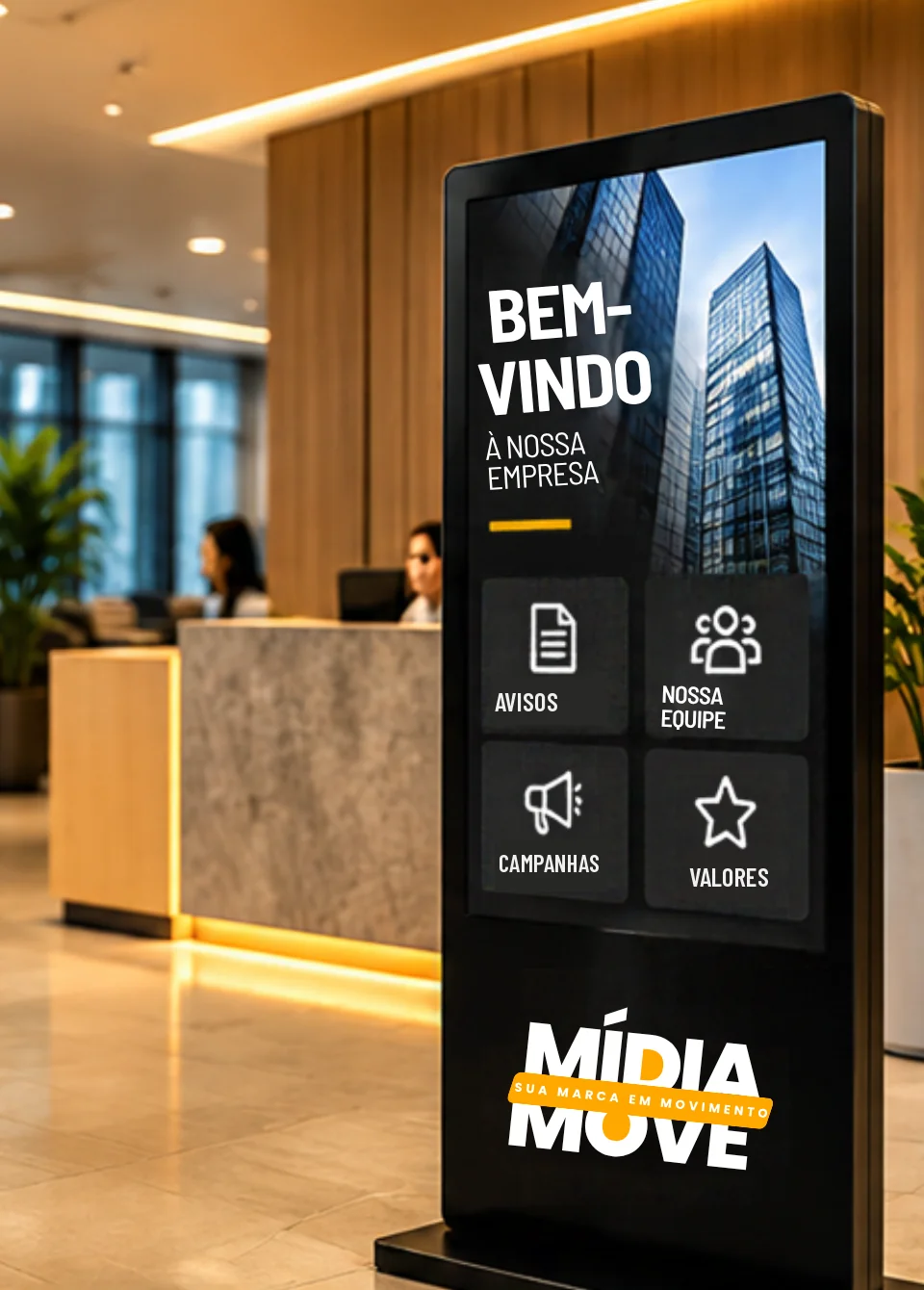 Totem digital Mídia Move na recepção de uma empresa, mostrando uma mensagem de boas-vindas